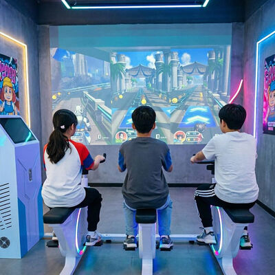 よい価格 5200ルーメンの高輝度、20000時間の光源寿命、フィットネスセンター向け6つのゲームシナリオを備えたスマートプロジェクションバイクゲーム オンライン